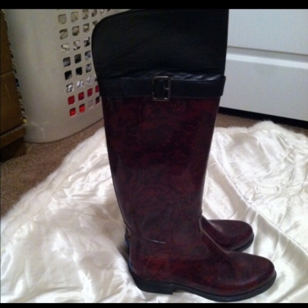 Knee high rain boots